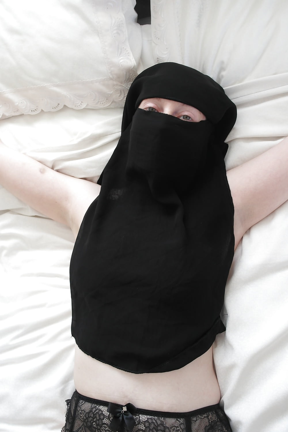 Niqab girl in Stockings Tied spread Eagle